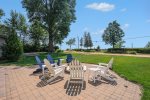 Enjoy the Soft Sounds of Lake Michigan While You Unwind by Blueberry Bluff`s Fire Pit